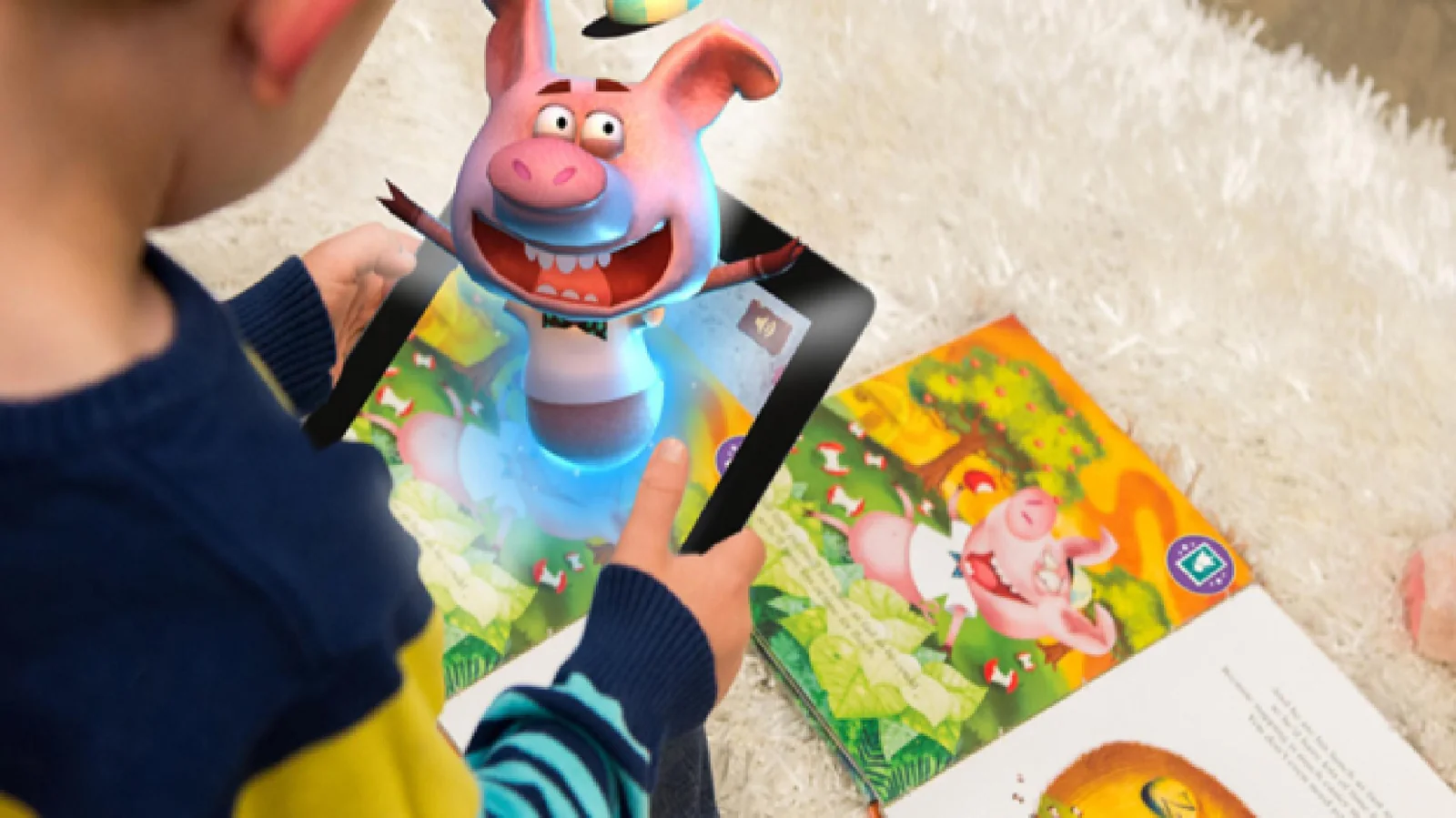 A child exploring augmented reality with a tablet